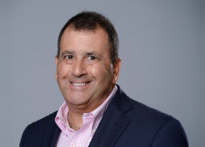 Headshot of Chief Human Resources Officer, Gregg Russo