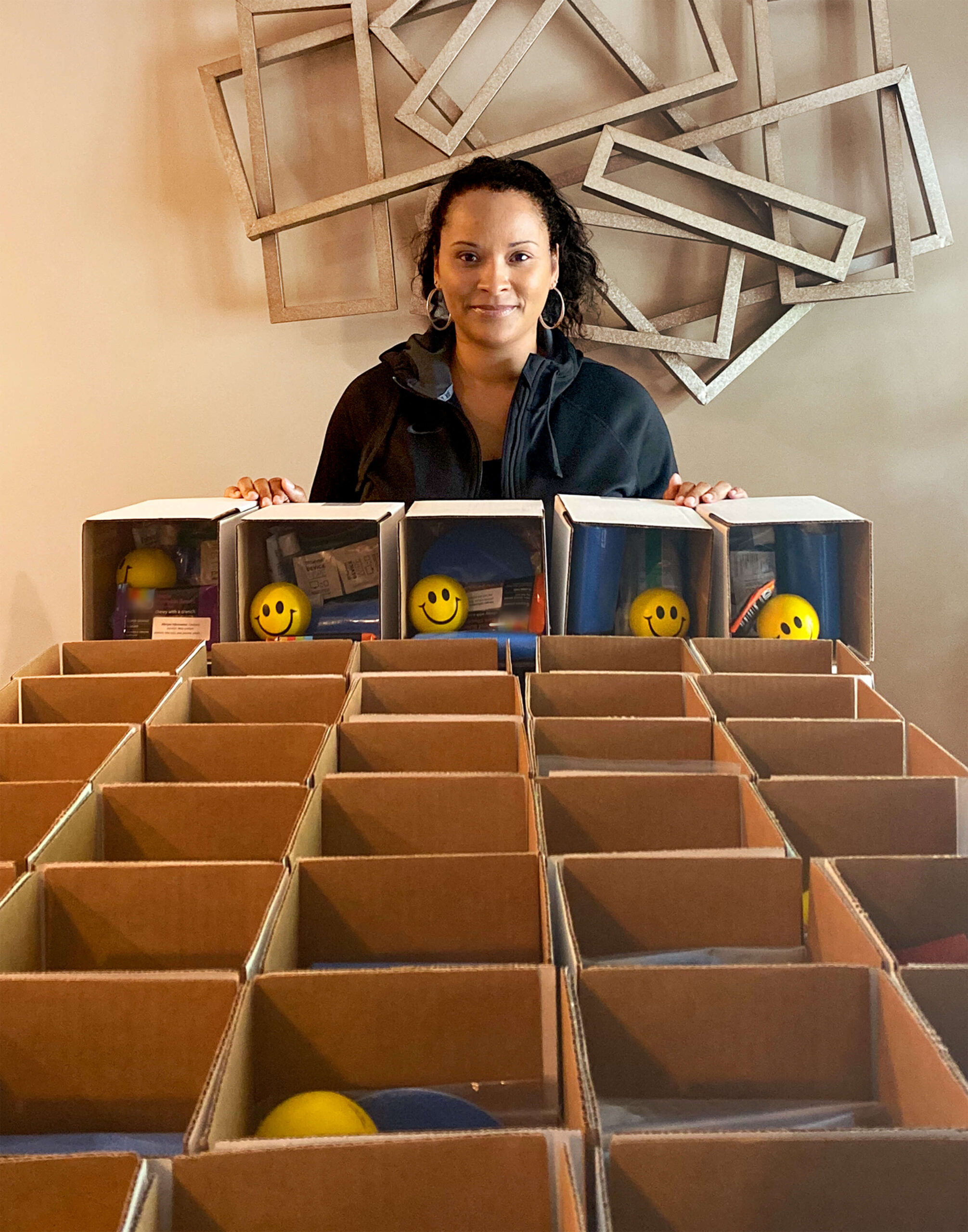A Catalyst employee posing at a volunteer event
